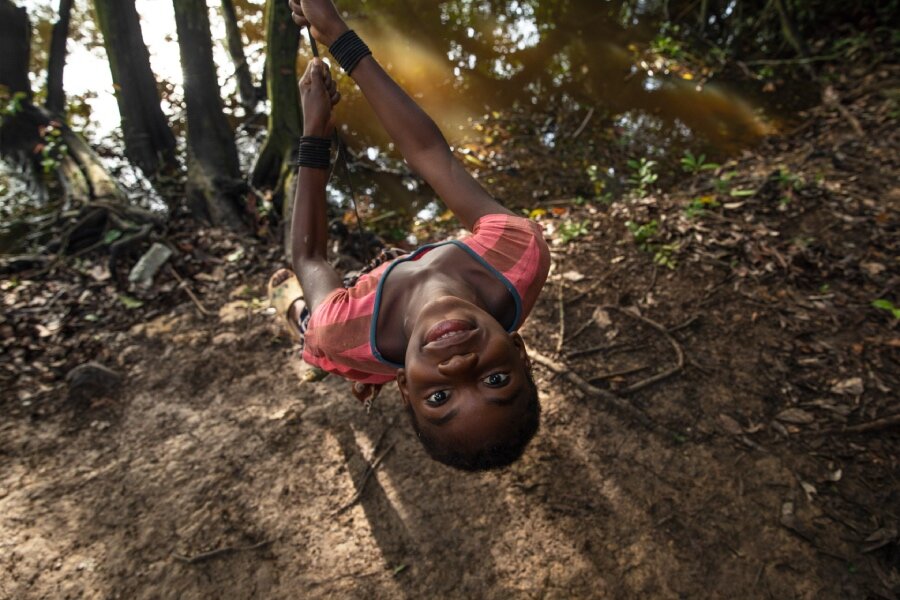 Annie plays in her beloved rainforest. Photo: WFP/Gabriela Vivaqua